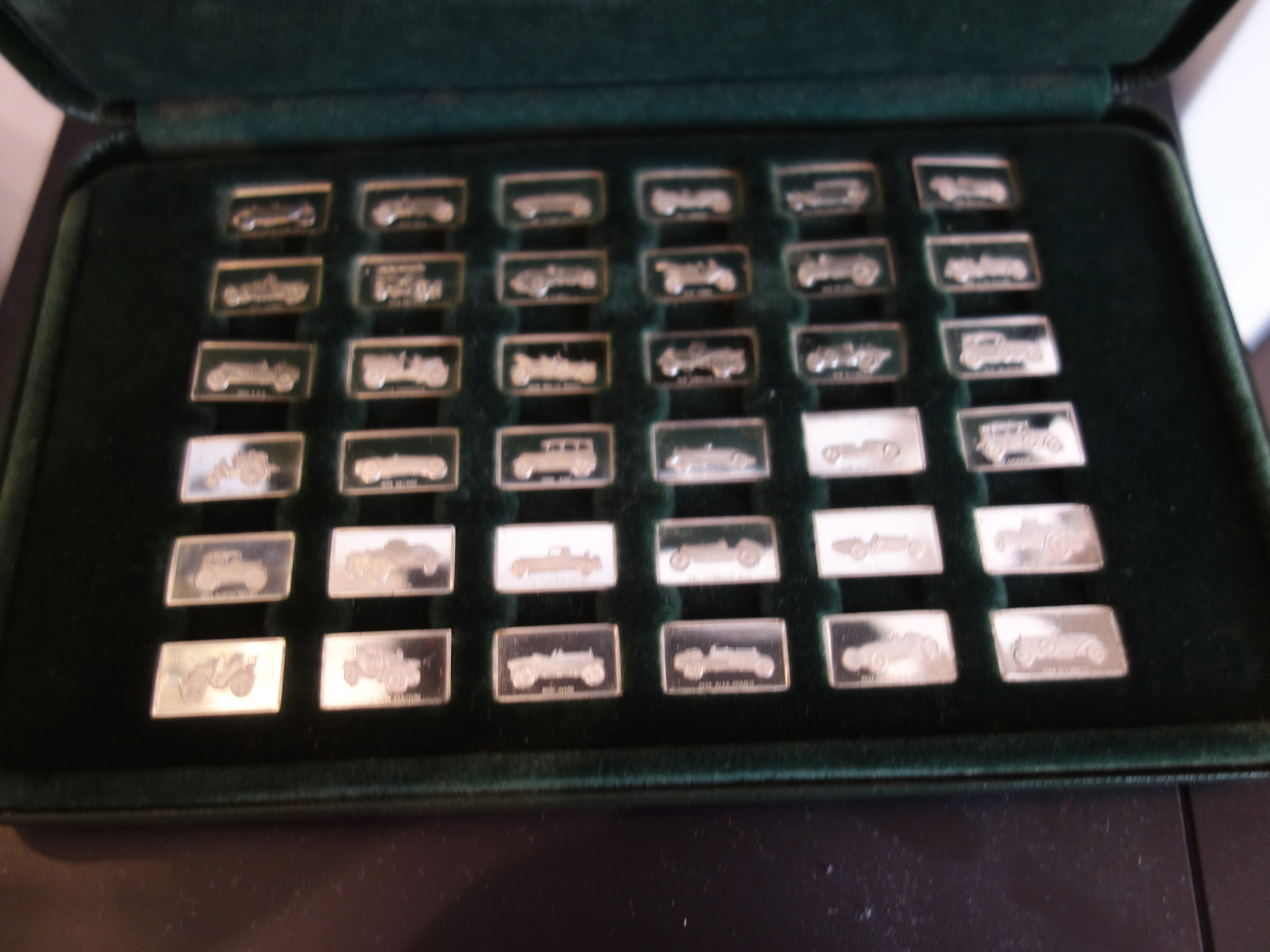 Franklin Mint Collectie 36 miniatuur zilverstaven beroemde auto's zilver